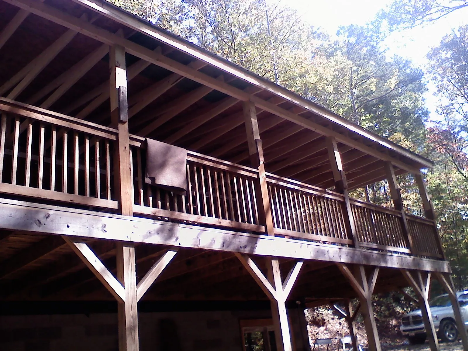 Timber framing under a new elevated porch and deck — Roof Leak Repair in Foothill Ranch by Roofing Brothers